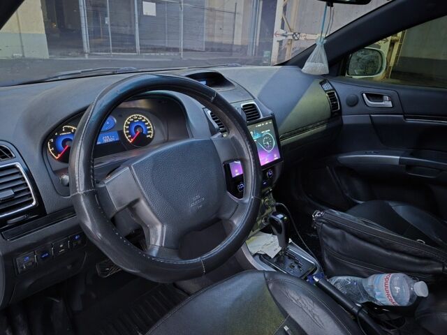 Белый Джили Эмгранд, объемом двигателя 1.8 л и пробегом 2 тыс. км за 4000 $, фото 18 на Automoto.ua