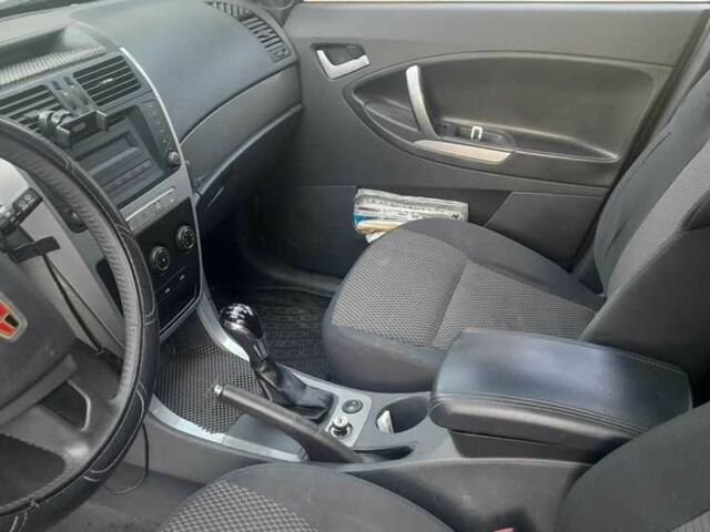 Білий Джилі Емгранд, об'ємом двигуна 1.78 л та пробігом 65 тис. км за 5600 $, фото 10 на Automoto.ua