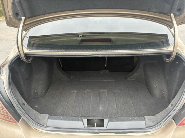 Бежевий Джилі Емгранд, об'ємом двигуна 1.8 л та пробігом 191 тис. км за 4299 $, фото 17 на Automoto.ua