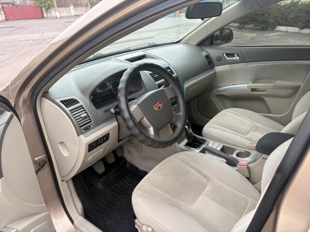 Бежевий Джилі Емгранд, об'ємом двигуна 1.8 л та пробігом 191 тис. км за 4299 $, фото 10 на Automoto.ua