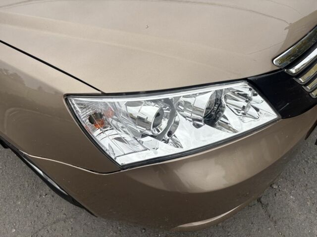 Бежевий Джилі Емгранд, об'ємом двигуна 1.8 л та пробігом 191 тис. км за 4299 $, фото 9 на Automoto.ua