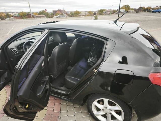Джилі Емгранд 2013 у Харкові на Automoto.ua Чорний Джилі Емгранд, об'ємом двигуна 1.8 л та пробігом 122 тис. км за 3500 $, фото 2 на Automoto.ua