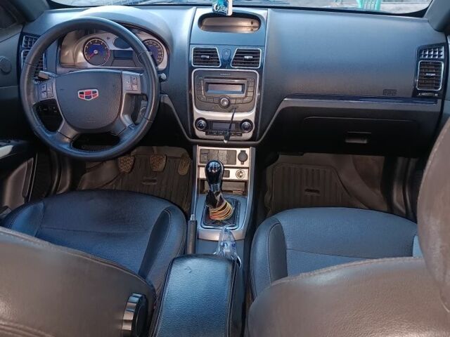 Черный Джили Эмгранд, объемом двигателя 1.8 л и пробегом 300 тыс. км за 4000 $, фото 2 на Automoto.ua