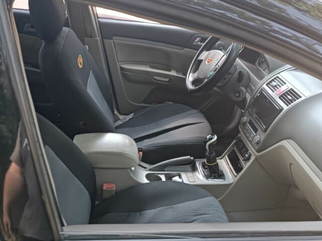 Черный Джили Эмгранд, объемом двигателя 1.8 л и пробегом 345 тыс. км за 2600 $, фото 6 на Automoto.ua