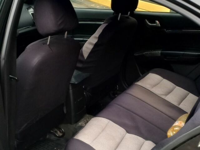 Черный Джили Эмгранд, объемом двигателя 1.8 л и пробегом 208 тыс. км за 3800 $, фото 8 на Automoto.ua