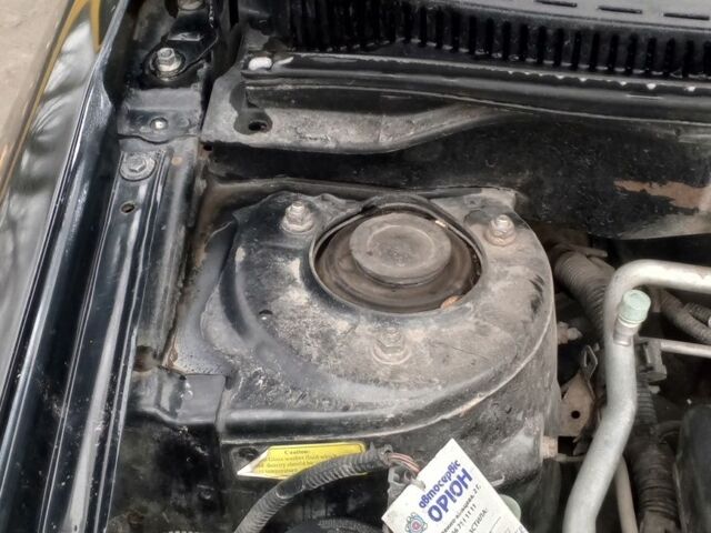 Черный Джили Эмгранд, объемом двигателя 1.8 л и пробегом 208 тыс. км за 3800 $, фото 9 на Automoto.ua