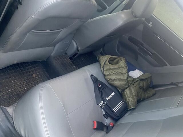 Черный Джили Эмгранд, объемом двигателя 1.8 л и пробегом 112 тыс. км за 2500 $, фото 5 на Automoto.ua