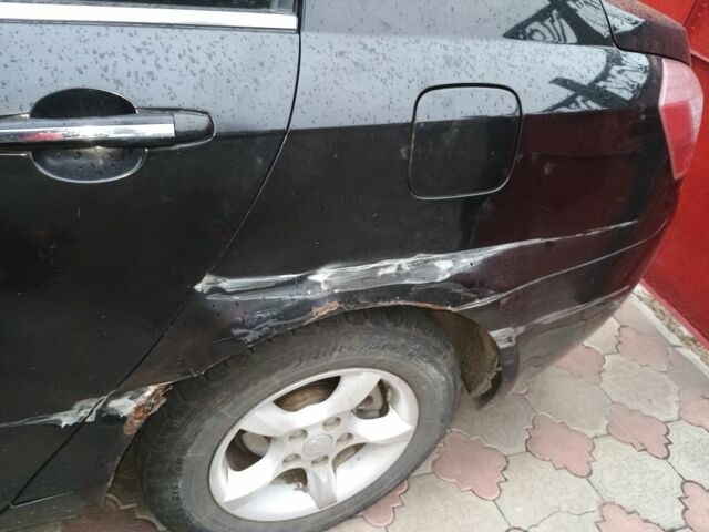 Черный Джили Эмгранд, объемом двигателя 1.8 л и пробегом 150 тыс. км за 2000 $, фото 2 на Automoto.ua