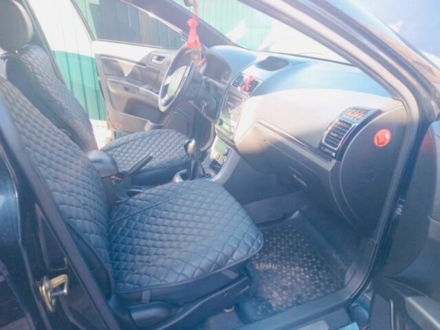 Черный Джили Эмгранд, объемом двигателя 1.8 л и пробегом 111 тыс. км за 5000 $, фото 3 на Automoto.ua