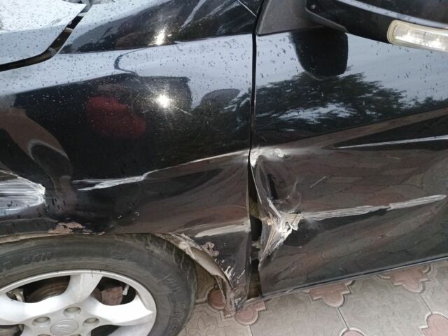 Черный Джили Эмгранд, объемом двигателя 1.8 л и пробегом 150 тыс. км за 2000 $, фото 1 на Automoto.ua