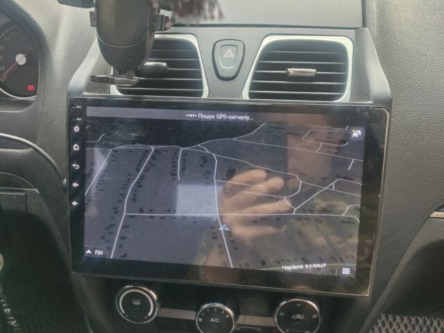 Чорний Джилі Емгранд, об'ємом двигуна 1.8 л та пробігом 148 тис. км за 4600 $, фото 4 на Automoto.ua