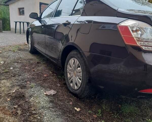 Коричневий Джилі Емгранд, об'ємом двигуна 1.5 л та пробігом 150 тис. км за 2960 $, фото 26 на Automoto.ua