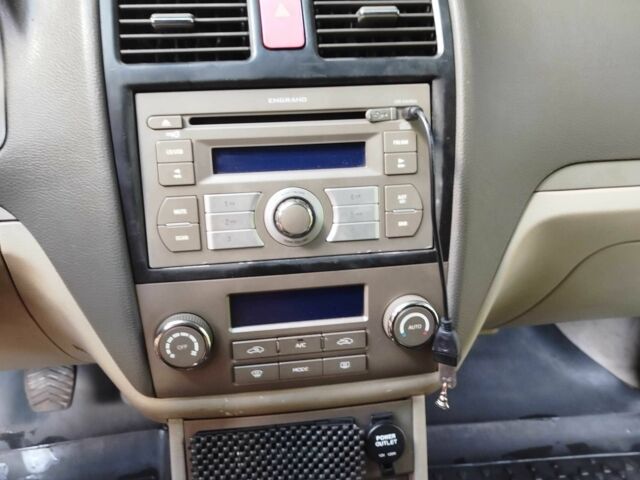 Коричневий Джилі Емгранд, об'ємом двигуна 1.8 л та пробігом 108 тис. км за 3200 $, фото 11 на Automoto.ua