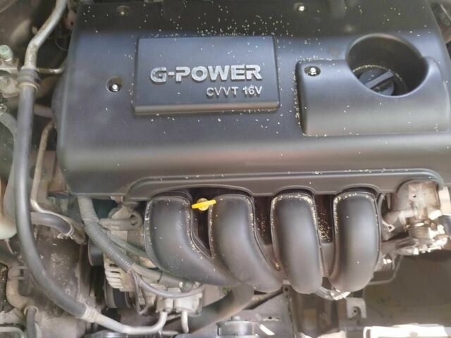 Коричневий Джилі Емгранд, об'ємом двигуна 1.8 л та пробігом 108 тис. км за 3200 $, фото 16 на Automoto.ua