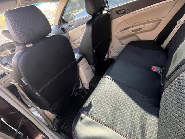 Коричневий Джилі Емгранд, об'ємом двигуна 1.8 л та пробігом 255 тис. км за 2200 $, фото 16 на Automoto.ua