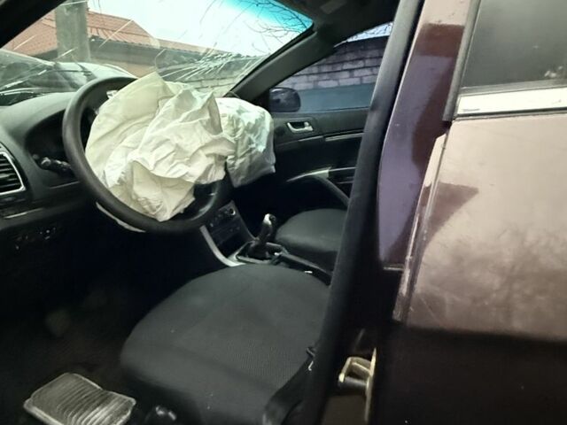 Коричневый Джили Эмгранд, объемом двигателя 1.8 л и пробегом 180 тыс. км за 1050 $, фото 3 на Automoto.ua