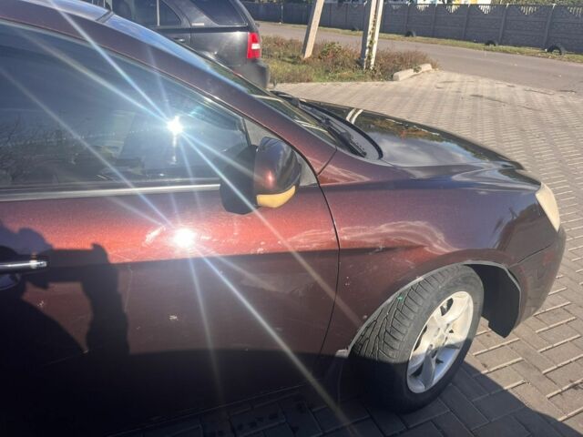 Коричневий Джилі Емгранд, об'ємом двигуна 1.8 л та пробігом 255 тис. км за 2200 $, фото 12 на Automoto.ua