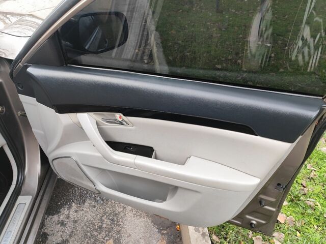 Коричневий Джилі Емгранд, об'ємом двигуна 2 л та пробігом 170 тис. км за 3800 $, фото 9 на Automoto.ua