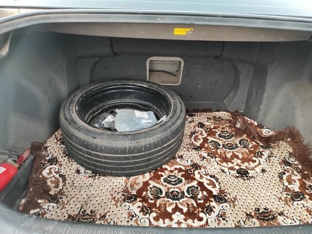 Коричневий Джилі Емгранд, об'ємом двигуна 2 л та пробігом 170 тис. км за 3800 $, фото 13 на Automoto.ua