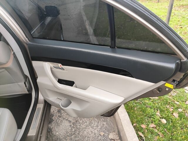 Коричневий Джилі Емгранд, об'ємом двигуна 2 л та пробігом 170 тис. км за 3800 $, фото 5 на Automoto.ua