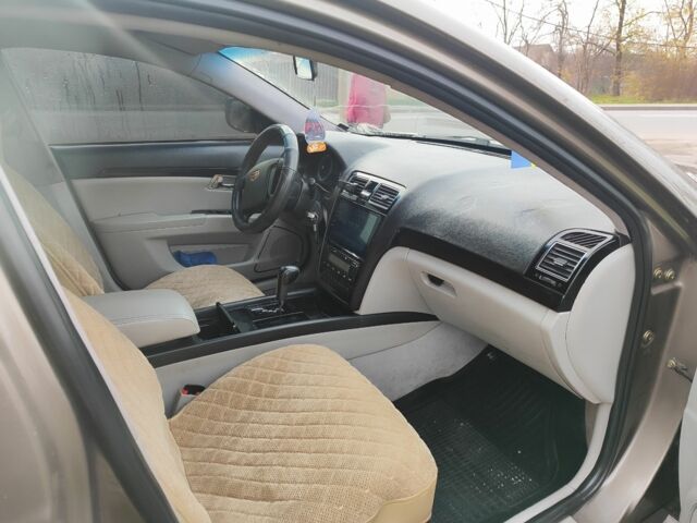 Коричневий Джилі Емгранд, об'ємом двигуна 2 л та пробігом 170 тис. км за 3800 $, фото 8 на Automoto.ua