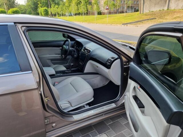 Коричневий Джилі Емгранд, об'ємом двигуна 2.4 л та пробігом 180 тис. км за 4450 $, фото 11 на Automoto.ua