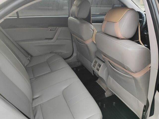 Коричневий Джилі Емгранд, об'ємом двигуна 2 л та пробігом 170 тис. км за 3800 $, фото 6 на Automoto.ua