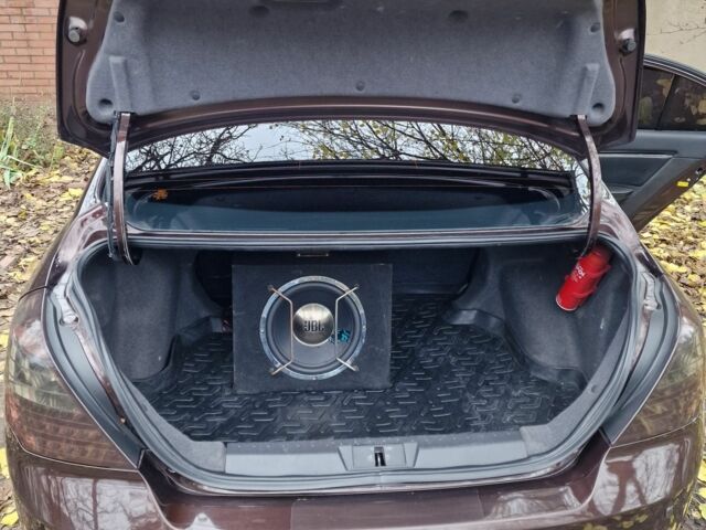 Коричневый Джили Эмгранд, объемом двигателя 1.8 л и пробегом 130 тыс. км за 5600 $, фото 14 на Automoto.ua