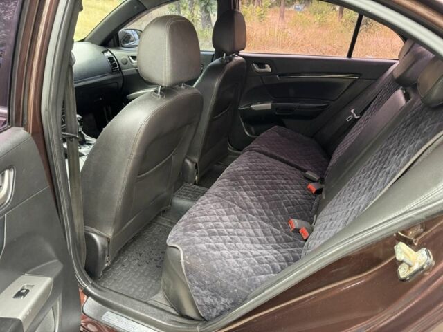 Коричневый Джили Эмгранд, объемом двигателя 1.5 л и пробегом 249 тыс. км за 3600 $, фото 4 на Automoto.ua