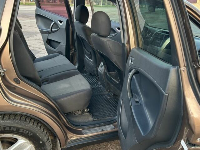 Коричневий Джилі Емгранд, об'ємом двигуна 2 л та пробігом 268 тис. км за 4799 $, фото 13 на Automoto.ua