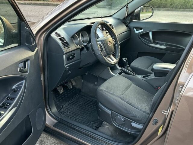 Коричневий Джилі Емгранд, об'ємом двигуна 2 л та пробігом 268 тис. км за 4799 $, фото 4 на Automoto.ua