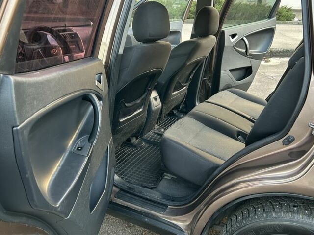 Коричневий Джилі Емгранд, об'ємом двигуна 2 л та пробігом 268 тис. км за 4799 $, фото 11 на Automoto.ua