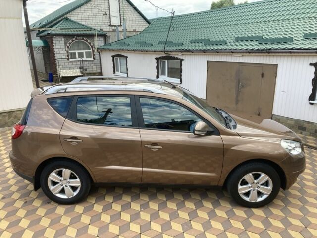 Коричневий Джилі Емгранд, об'ємом двигуна 2 л та пробігом 122 тис. км за 6000 $, фото 2 на Automoto.ua