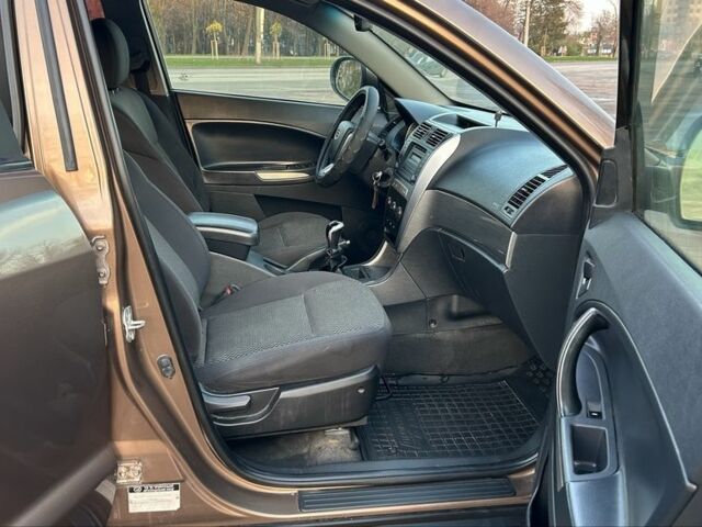 Коричневий Джилі Емгранд, об'ємом двигуна 2 л та пробігом 268 тис. км за 4799 $, фото 10 на Automoto.ua