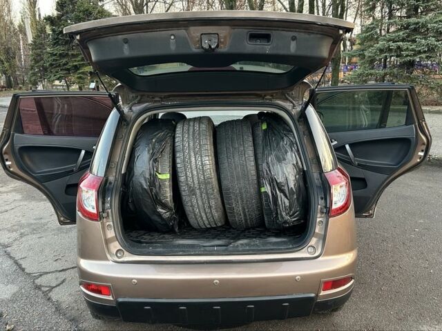 Коричневий Джилі Емгранд, об'ємом двигуна 2 л та пробігом 268 тис. км за 4799 $, фото 15 на Automoto.ua