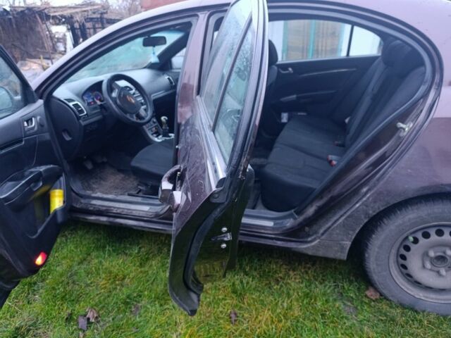 Червоний Джилі Емгранд, об'ємом двигуна 1.8 л та пробігом 65 тис. км за 2800 $, фото 5 на Automoto.ua