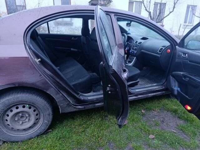 Червоний Джилі Емгранд, об'ємом двигуна 1.8 л та пробігом 65 тис. км за 2800 $, фото 4 на Automoto.ua