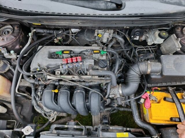 Червоний Джилі Емгранд, об'ємом двигуна 1.8 л та пробігом 65 тис. км за 2800 $, фото 7 на Automoto.ua