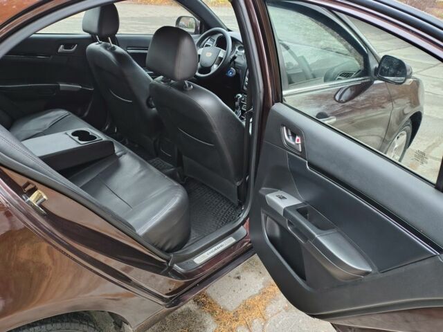 Червоний Джилі Емгранд, об'ємом двигуна 1.8 л та пробігом 154 тис. км за 4000 $, фото 5 на Automoto.ua