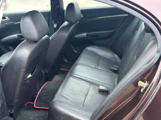 Красный Джили Эмгранд, объемом двигателя 1.8 л и пробегом 122 тыс. км за 4450 $, фото 2 на Automoto.ua