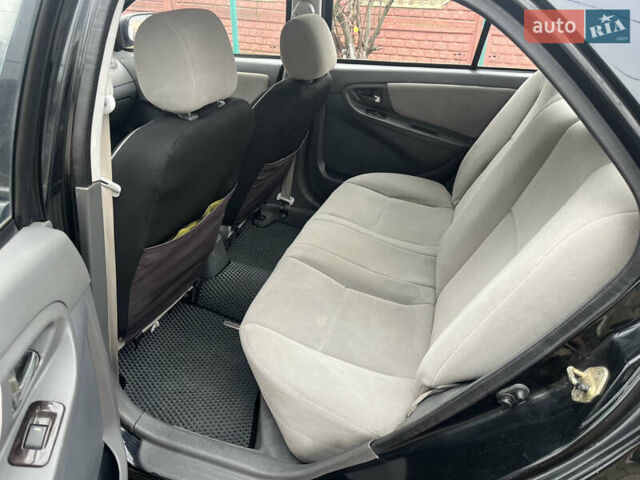 Черный Джили МК, объемом двигателя 1.59 л и пробегом 125 тыс. км за 2350 $, фото 1 на Automoto.ua