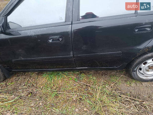 Черный Джили МР, объемом двигателя 1.5 л и пробегом 333 тыс. км за 850 $, фото 3 на Automoto.ua