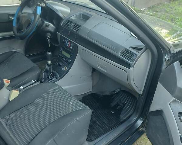 Черный Джили МР, объемом двигателя 1.5 л и пробегом 250 тыс. км за 1550 $, фото 13 на Automoto.ua