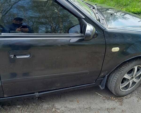 Черный Джили МР, объемом двигателя 1.5 л и пробегом 210 тыс. км за 2400 $, фото 3 на Automoto.ua