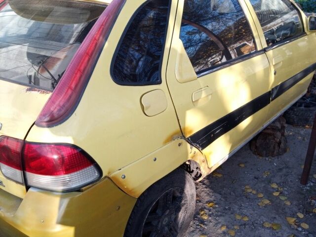 Желтый Джили Мапл, объемом двигателя 1.8 л и пробегом 100 тыс. км за 953 $, фото 8 на Automoto.ua