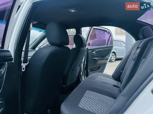 Білий Джилі СЛ, об'ємом двигуна 1.79 л та пробігом 184 тис. км за 3400 $, фото 12 на Automoto.ua