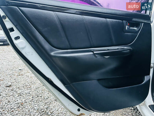 Білий Джилі СЛ, об'ємом двигуна 1.79 л та пробігом 184 тис. км за 3400 $, фото 15 на Automoto.ua