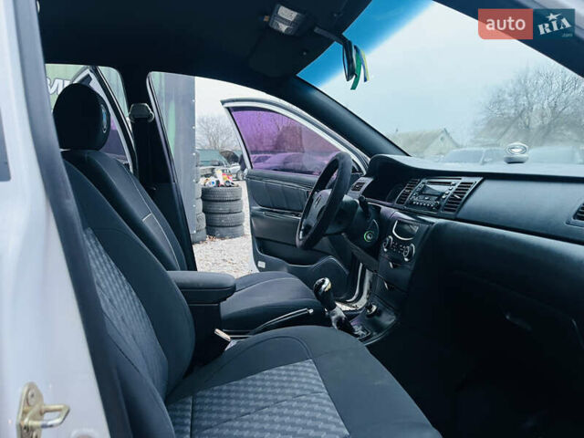 Білий Джилі СЛ, об'ємом двигуна 1.79 л та пробігом 184 тис. км за 3400 $, фото 18 на Automoto.ua