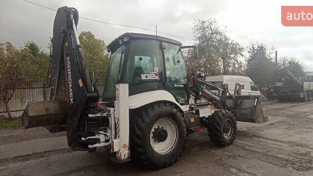 Белый Гидромек HMK 102B Alpha, объемом двигателя 4.4 л и пробегом 650 тыс. км за 71861 $, фото 7 на Automoto.ua