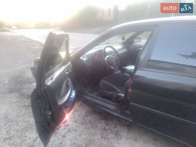 Черный Хонда Аккорд, объемом двигателя 2 л и пробегом 375 тыс. км за 2450 $, фото 5 на Automoto.ua